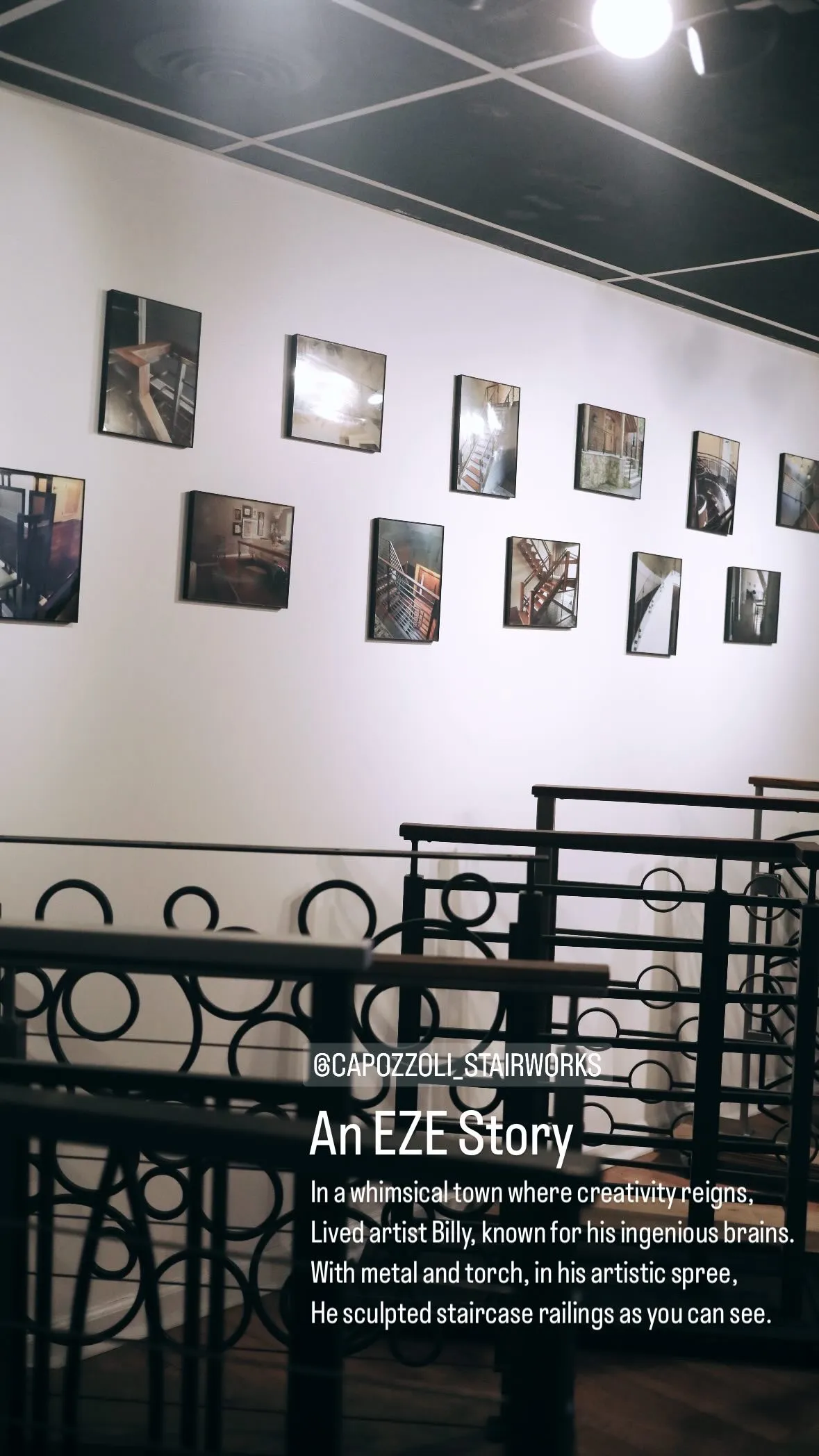 Modern interior featuring black circular-patterned metal staircase railings and framed photos on a white wall, with text about artist Billy sculpting staircase railings.