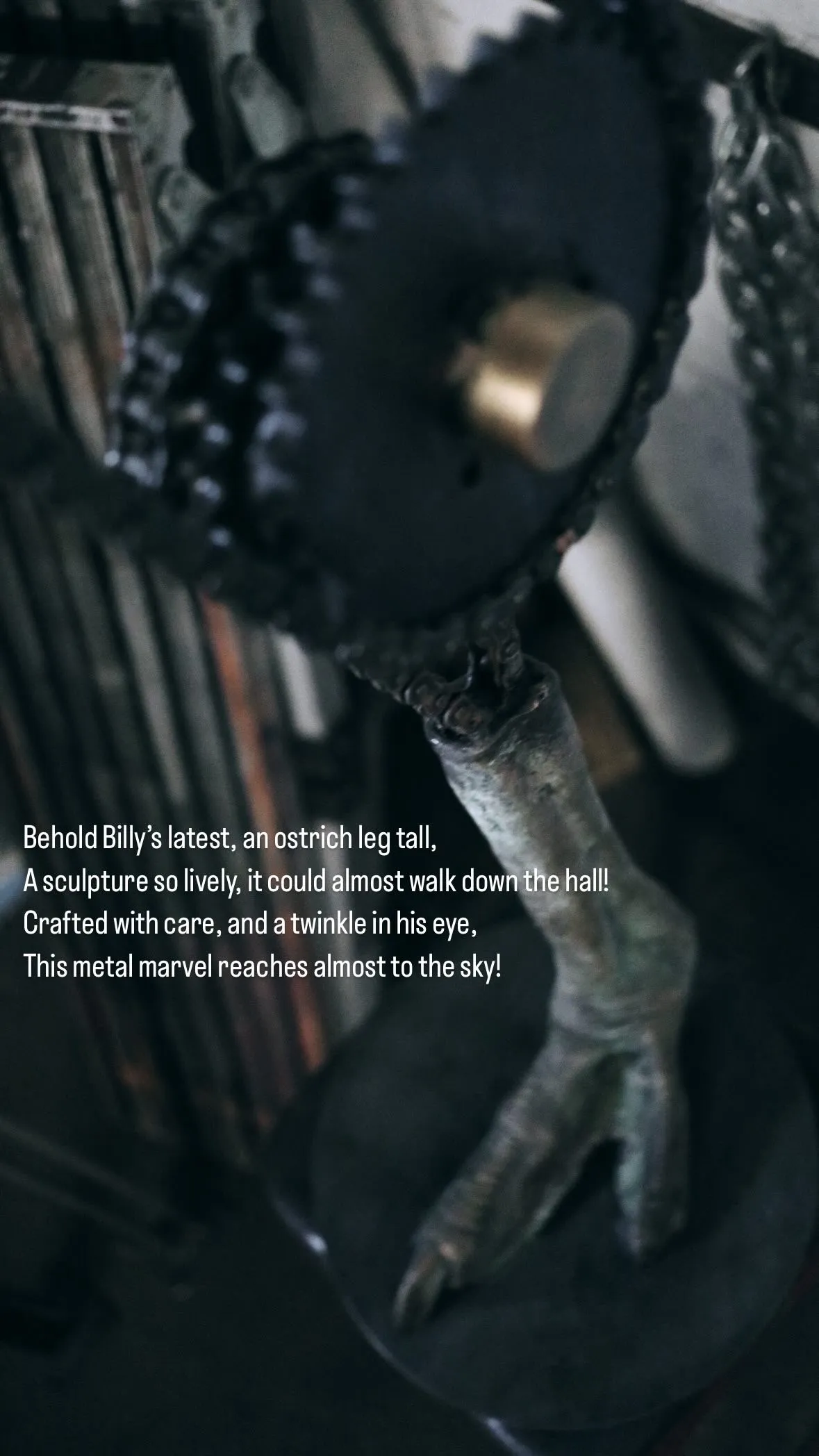 Close-up of a metal sculpture resembling an ostrich leg with mechanical joints and chains.